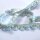 Synthetic Spitze türkis grau meliert 2,4cm hoch Meterware